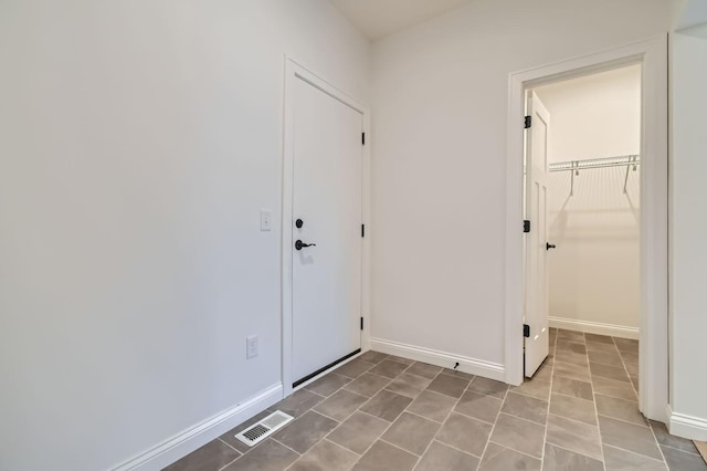 917 174th Ave NE, Ham Lake, MN 55304 - unfurnished bedroom with baseboards and a closet