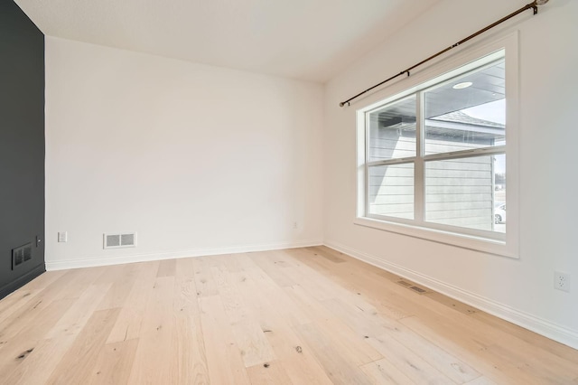 917 174th Ave NE, Ham Lake, MN 55304 - spare room with wood finished floors