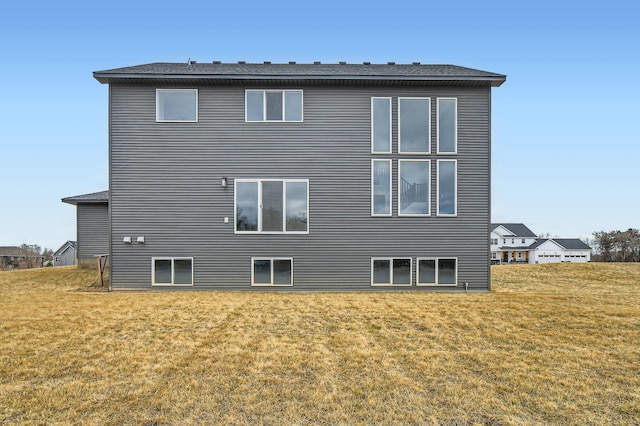 917 174th Ave NE, Ham Lake, MN 55304 - rear view of house with a lawn