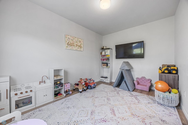 8871 Cottonwood Blvd, Horace, ND 58047 - playroom featuring wood finished floors