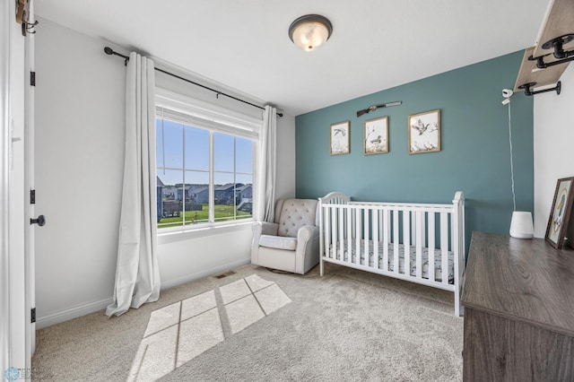 8871 Cottonwood Blvd, Horace, ND 58047 - bedroom with carpet flooring and a crib