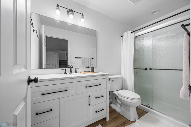 8871 Cottonwood Blvd, Horace, ND 58047 - full bathroom featuring a shower stall, vanity, and wood finished floors