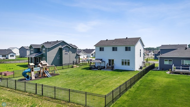 8871 Cottonwood Blvd, Horace, ND 58047 - rear view of property with a residential view, a playground, a fenced backyard, and a patio area