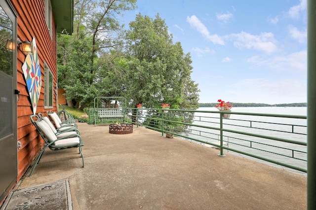 24301 Cedar Lake Dr, Helena Twp, MN 56071 - patio / terrace featuring a water view