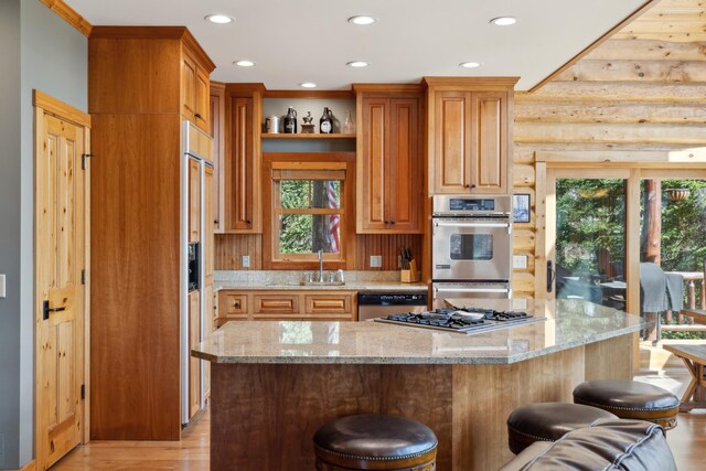 15193 Wilderness Trl, Crosslake, MN 56442 - kitchen featuring stainless steel appliances, open shelves, a kitchen breakfast bar, plenty of natural light, and recessed lighting