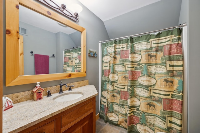 15193 Wilderness Trl, Crosslake, MN 56442 - full bath featuring vaulted ceiling, vanity, and a shower with shower curtain