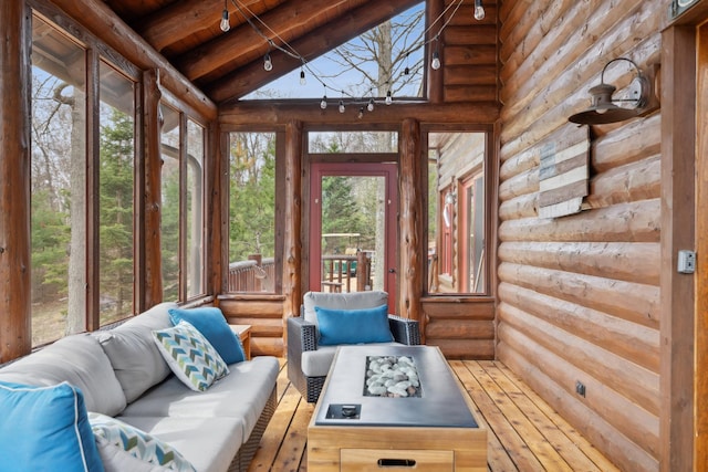 15193 Wilderness Trl, Crosslake, MN 56442 - sunroom / solarium with an outdoor living space, rustic walls, rail lighting, and wood ceiling