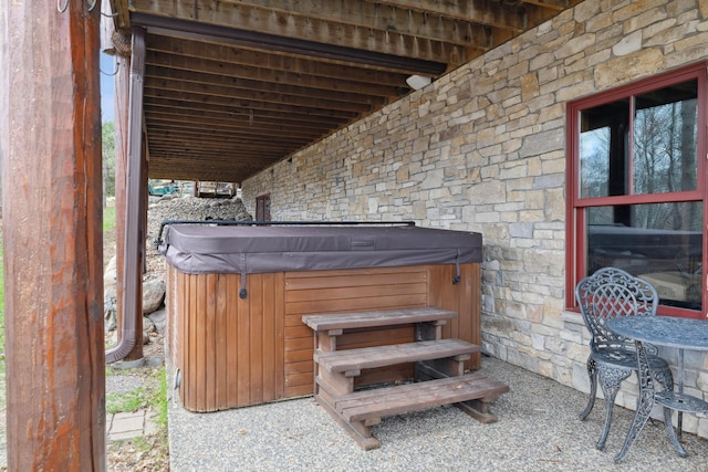 15193 Wilderness Trl, Crosslake, MN 56442 - view of patio featuring a hot tub