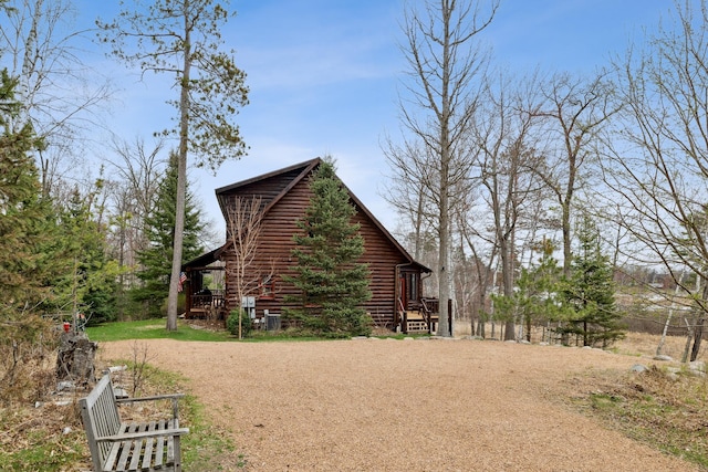 15193 Wilderness Trl, Crosslake, MN 56442 - view of property exterior featuring log exterior
