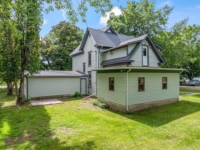 202 Cedar St, Pepin, WI 54759 - view of property exterior with a lawn and roof with shingles