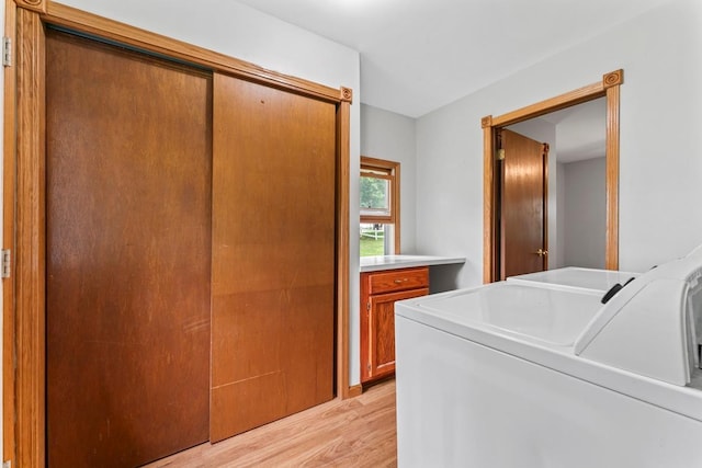 202 Cedar St, Pepin, WI 54759 - laundry area featuring separate washer and dryer and light wood finished floors
