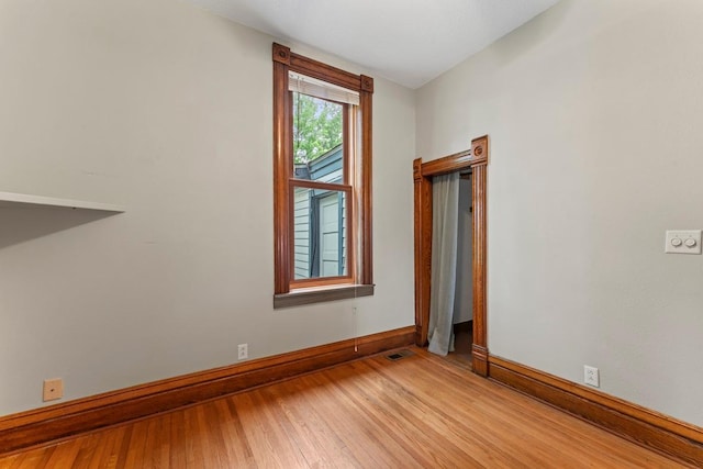 202 Cedar St, Pepin, WI 54759 - empty room with baseboards and light wood-style floors