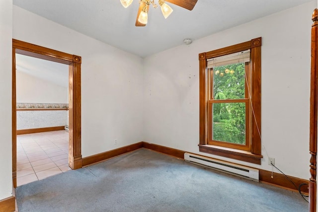 202 Cedar St, Pepin, WI 54759 - unfurnished room with baseboard heating, a ceiling fan, carpet, and a smoke detector
