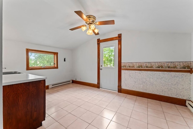 202 Cedar St, Pepin, WI 54759 - interior space featuring a baseboard radiator, lofted ceiling, healthy amount of natural light, and a ceiling fan