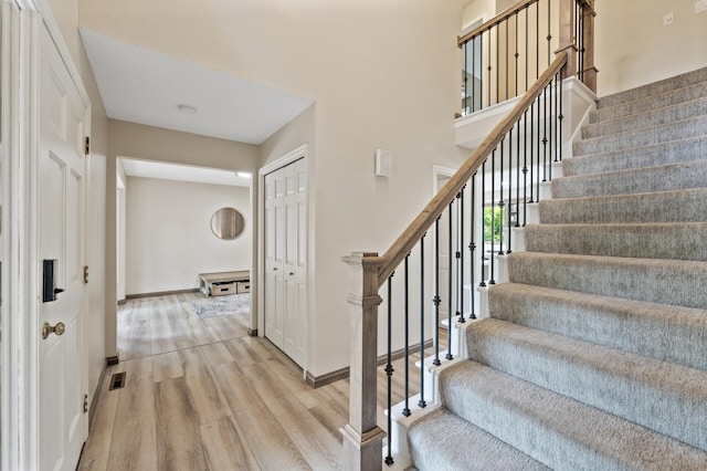 9950 204th Street Ct N, Forest Lake, MN 55025 - stairs with wood finished floors and baseboards