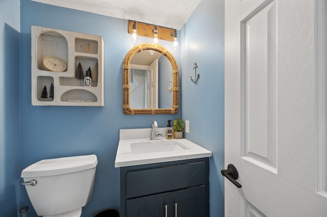 9950 204th Street Ct N, Forest Lake, MN 55025 - half bath with vanity and a textured ceiling