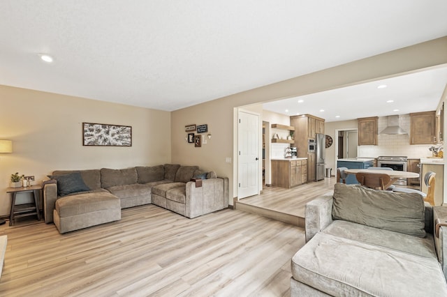 9950 204th Street Ct N, Forest Lake, MN 55025 - living area featuring light wood-style floors and recessed lighting