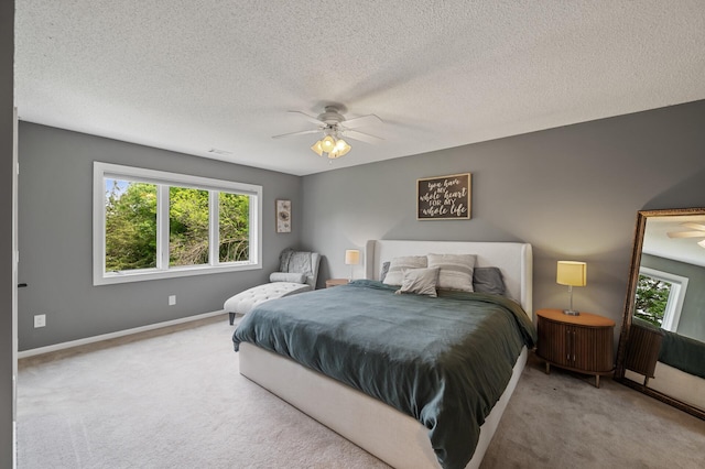 9950 204th Street Ct N, Forest Lake, MN 55025 - bedroom featuring carpet floors, multiple windows, a textured ceiling, and ceiling fan