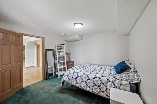 9950 204th Street Ct N, Forest Lake, MN 55025 - carpeted bedroom featuring a textured ceiling