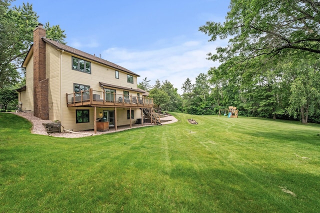 9950 204th Street Ct N, Forest Lake, MN 55025 - back of property featuring a chimney, a yard, a wooden deck, and a patio area