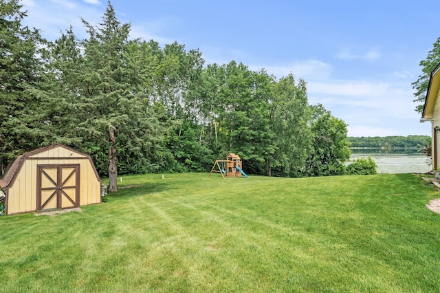 9950 204th Street Ct N, Forest Lake, MN 55025 - view of grassy yard with a shed and a playground