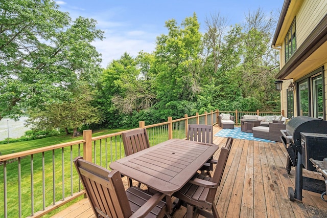 9950 204th Street Ct N, Forest Lake, MN 55025 - wooden terrace featuring an outdoor hangout area, a lawn, outdoor dining space, and area for grilling