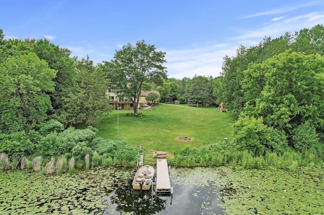 9950 204th Street Ct N, Forest Lake, MN 55025 - view of grassy yard featuring a boat dock and a water view