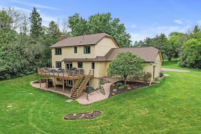 9950 204th Street Ct N, Forest Lake, MN 55025 - rear view of house with a deck, a chimney, a lawn, a patio, and stairs