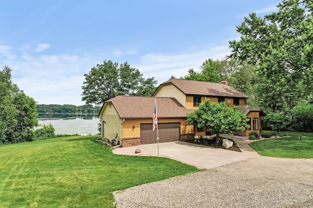 9950 204th Street Ct N, Forest Lake, MN 55025 - view of front of home with a garage, a front lawn, driveway, a chimney, and roof with shingles