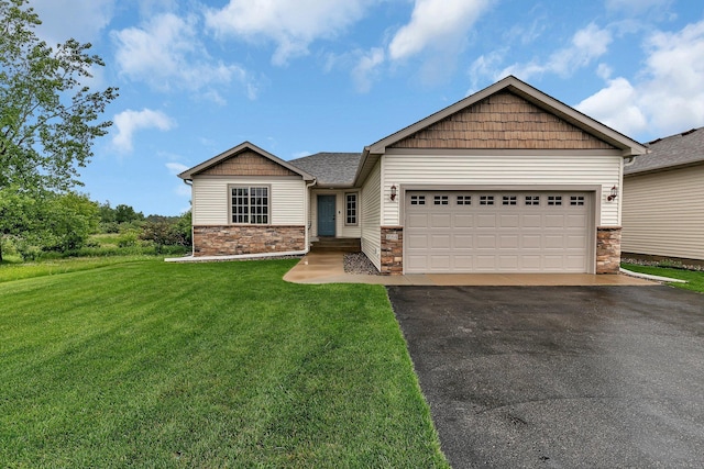 1664 Payton Ct NE, Sauk Rapids, MN 56379 - craftsman inspired home with driveway, stone siding, a front lawn, and a garage
