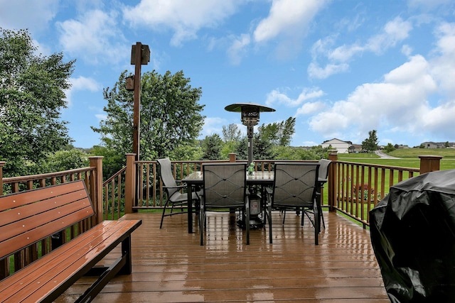 1664 Payton Ct NE, Sauk Rapids, MN 56379 - wooden deck featuring outdoor dining area and a grill
