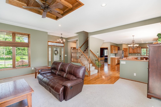 517 Redpoll Ave SE, New Prague, MN 56071 - living room featuring a chandelier, stairs, healthy amount of natural light, recessed lighting, and ornamental molding