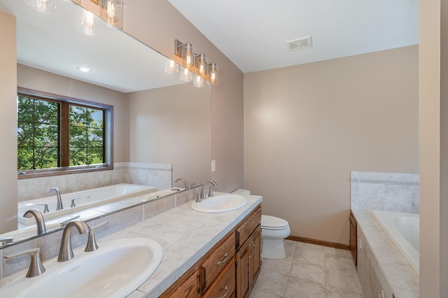 517 Redpoll Ave SE, New Prague, MN 56071 - bathroom featuring a garden tub and double vanity