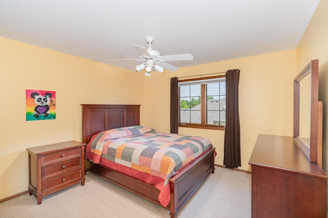 517 Redpoll Ave SE, New Prague, MN 56071 - bedroom featuring light colored carpet, a ceiling fan, and a textured ceiling