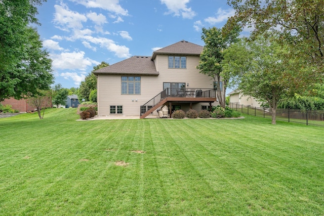 517 Redpoll Ave SE, New Prague, MN 56071 - rear view of property featuring a deck, stairs, a patio, and roof with shingles
