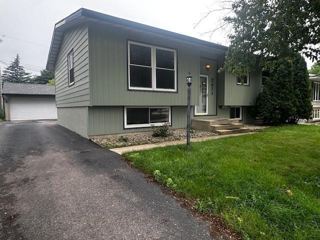 2671 4th Ave NE, Rochester, MN 55906 - split foyer home with an outbuilding, a garage, and a front yard