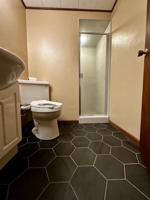 2671 4th Ave NE, Rochester, MN 55906 - bathroom with a stall shower, vanity, and ornamental molding