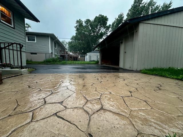 2671 4th Ave NE, Rochester, MN 55906 - view of home's exterior with driveway