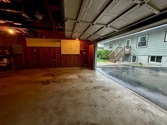 2671 4th Ave NE, Rochester, MN 55906 - garage featuring wooden walls