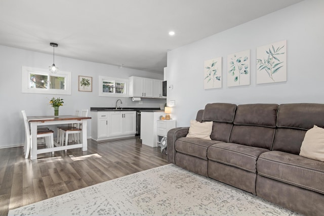 706 2nd Ave NW, New Brighton, MN 55112 - living area featuring dark wood-type flooring and recessed lighting