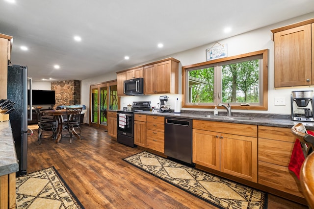 11100 Fisher Ln, Park Rapids, MN 56470 - kitchen with dishwasher, electric range, freestanding refrigerator, dark wood-type flooring, and recessed lighting