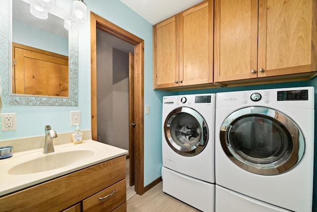 11100 Fisher Ln, Park Rapids, MN 56470 - washroom featuring washing machine and clothes dryer and a sink