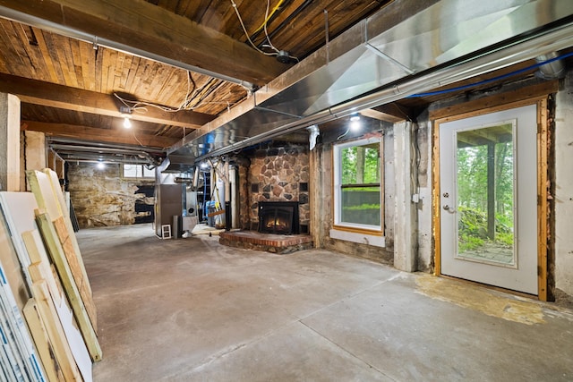 11100 Fisher Ln, Park Rapids, MN 56470 - below grade area featuring plenty of natural light and a stone fireplace