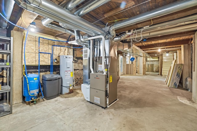 11100 Fisher Ln, Park Rapids, MN 56470 - unfinished below grade area featuring electric water heater, a water pressure tank, and heating unit