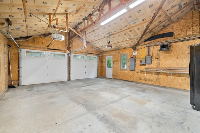 11100 Fisher Ln, Park Rapids, MN 56470 - garage featuring electric panel and a garage door opener