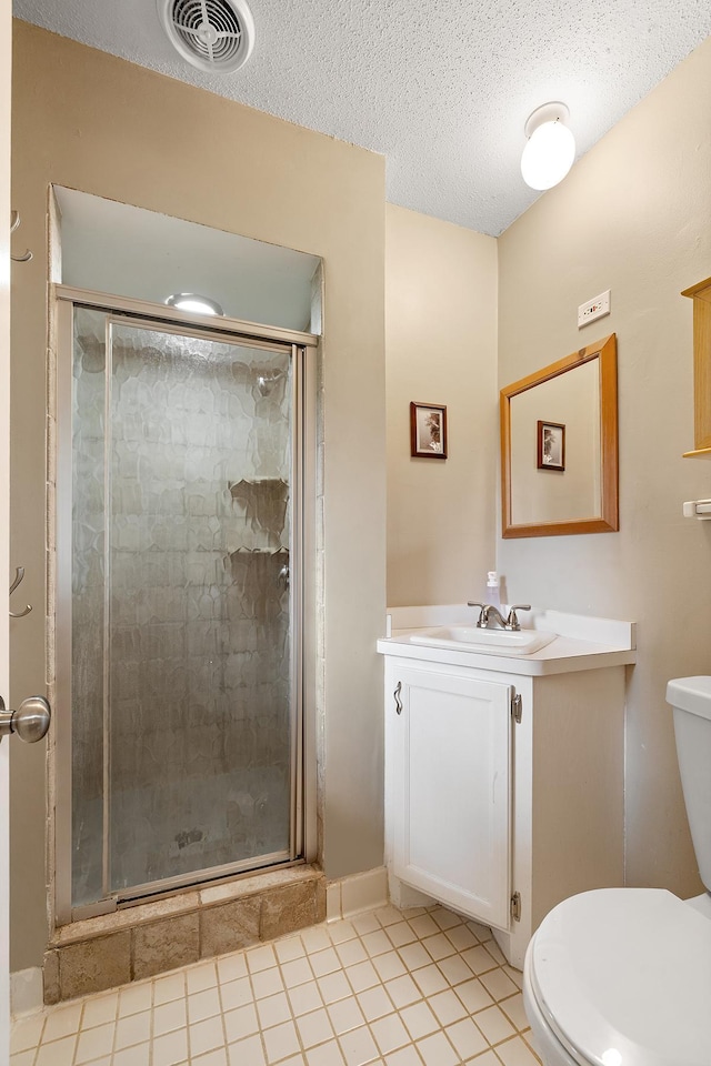 6721 Limerick Ln, Edina, MN 55439 - full bath featuring vanity, a shower stall, tile patterned floors, and a textured ceiling