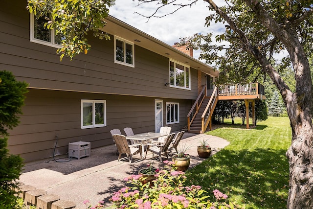 6721 Limerick Ln, Edina, MN 55439 - rear view of house with a patio area, stairs, a chimney, a deck, and a yard