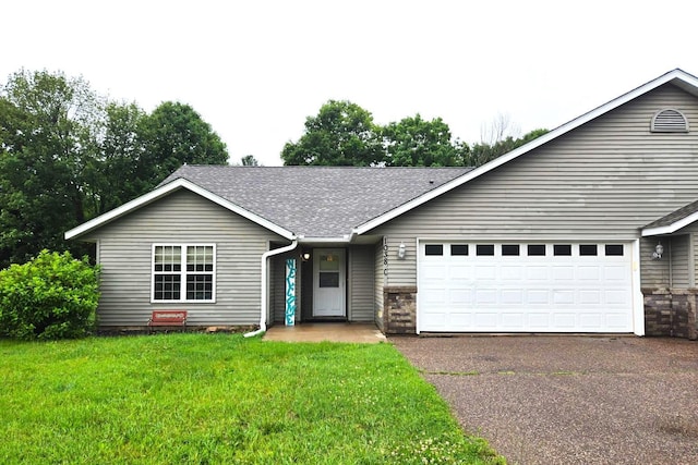 1038 Syme Ave Unit C, Cady Twp, WI 54013 - single story home with a garage, driveway, roof with shingles, and a front lawn