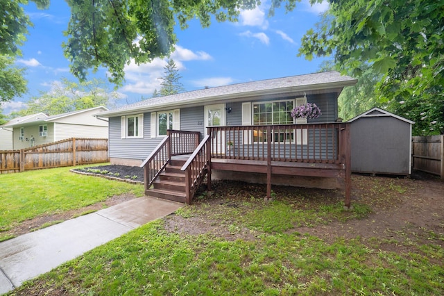 311 70th Ave W, Duluth, MN 55807 - single story home with a wooden deck and a storage unit