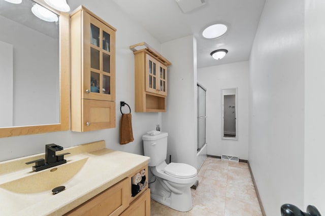 311 70th Ave W, Duluth, MN 55807 - full bathroom featuring vanity, tile patterned flooring, and shower / bath combination with glass door